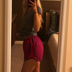 pink/red/blue nike shorts